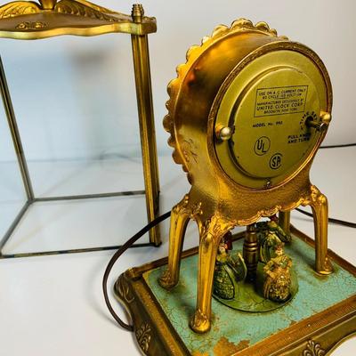 LOT 123: Vintage Electric United Motion Mantle Clock Model No. 990 Victorian Dancers