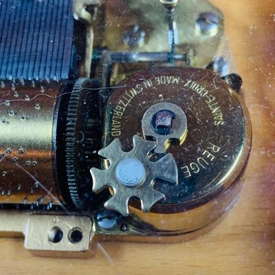 LOT 126: Collection of Wooden Music Boxes Including a Grand Piano Shaped Box, a Floral Inlay Box by Reuge and Lasercraft Carved Music Box