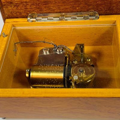 LOT 126: Collection of Wooden Music Boxes Including a Grand Piano Shaped Box, a Floral Inlay Box by Reuge and Lasercraft Carved Music Box