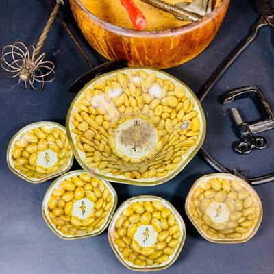 LOT 131: Vintage and Unusual Kitchen Gadgets; Planter’s Peanuts Serving Bowls and a Perfection Nutcracker and Wooden Bowl