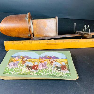 LOT 132: Antique Wood Stereoscope with Steroview Picture Cards of Victorian Christmas and More and Stereoview Scentic Pictures from...