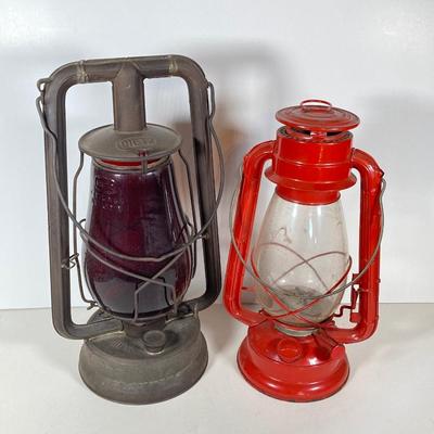 LOT 138: Three Oil Lanterns - Dietz (Gray) and Winged Wheel Brand (Red and Yellow)
