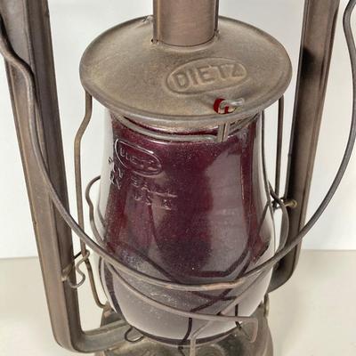 LOT 138: Three Oil Lanterns - Dietz (Gray) and Winged Wheel Brand (Red and Yellow)