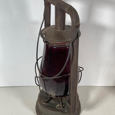 LOT 138: Three Oil Lanterns - Dietz (Gray) and Winged Wheel Brand (Red and Yellow)