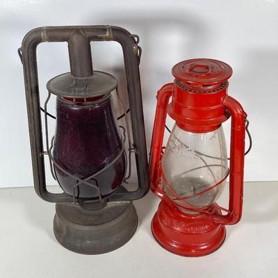 LOT 138: Three Oil Lanterns - Dietz (Gray) and Winged Wheel Brand (Red and Yellow)