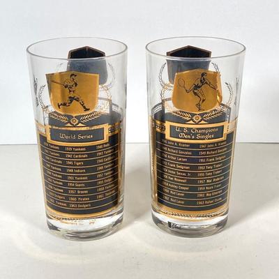 LOT 144: Seven MCM Sports Black and Gold Drinking Glasses / Barware