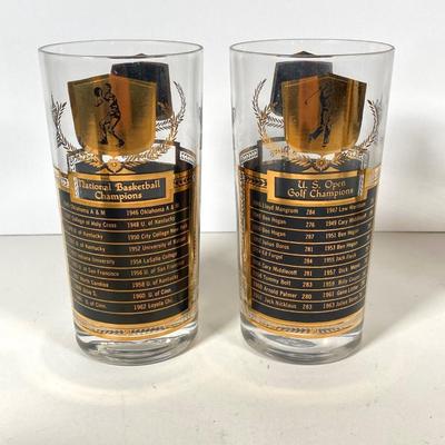 LOT 144: Seven MCM Sports Black and Gold Drinking Glasses / Barware