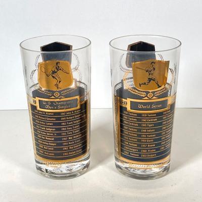 LOT 144: Seven MCM Sports Black and Gold Drinking Glasses / Barware
