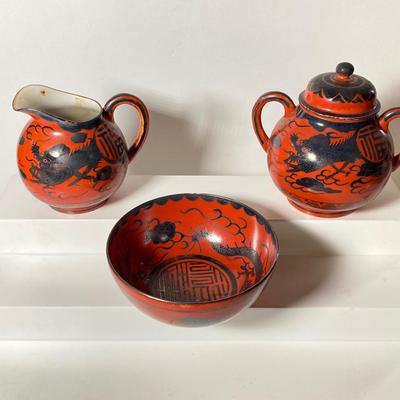 LOT 150: Antique / Vintage Asian Red / Coral and Black Dragon Themed Dinnerware Set
