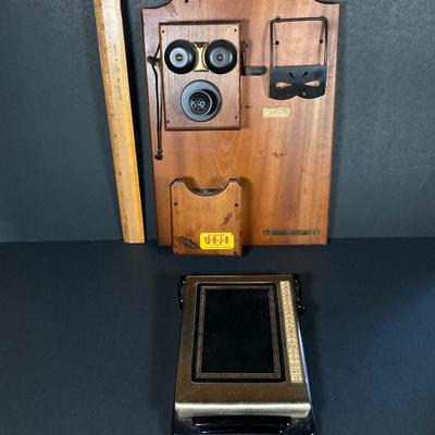 LOT 158: Vintage Telephone Message Center, Bates Cavalier List Finder and Three Telephone Bank / Tins