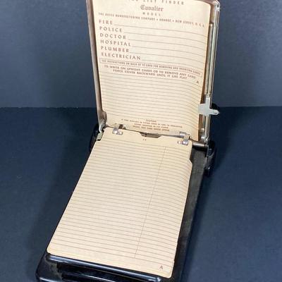 LOT 158: Vintage Telephone Message Center, Bates Cavalier List Finder and Three Telephone Bank / Tins