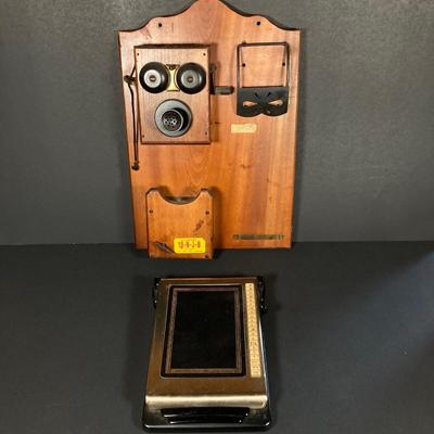 LOT 158: Vintage Telephone Message Center, Bates Cavalier List Finder and Three Telephone Bank / Tins