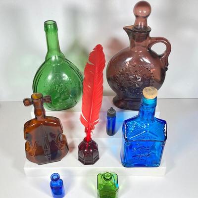 LOT 162: Colorful Glass Bottle Collection - Fislerville Glass Works Green Jenny Lind, Amethyst Colored, Violin Shaped, Wheaton Ink and More