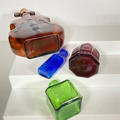LOT 162: Colorful Glass Bottle Collection - Fislerville Glass Works Green Jenny Lind, Amethyst Colored, Violin Shaped, Wheaton Ink and More