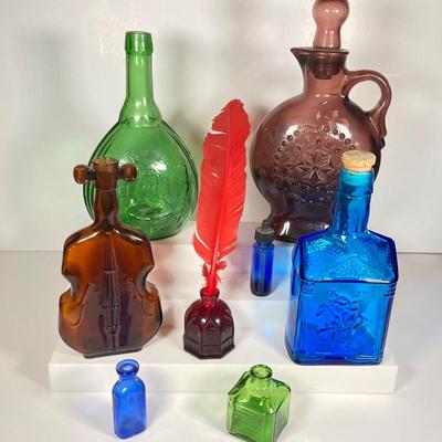 LOT 162: Colorful Glass Bottle Collection - Fislerville Glass Works Green Jenny Lind, Amethyst Colored, Violin Shaped, Wheaton Ink and More