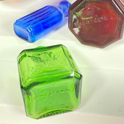 LOT 162: Colorful Glass Bottle Collection - Fislerville Glass Works Green Jenny Lind, Amethyst Colored, Violin Shaped, Wheaton Ink and More