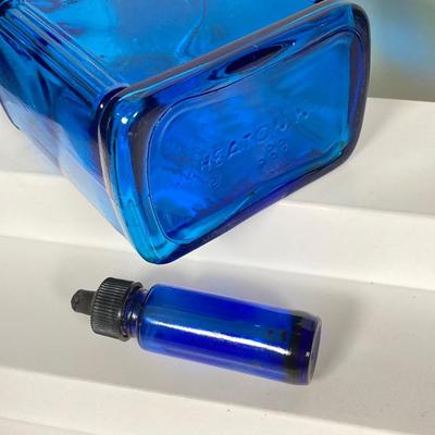 LOT 162: Colorful Glass Bottle Collection - Fislerville Glass Works Green Jenny Lind, Amethyst Colored, Violin Shaped, Wheaton Ink and More