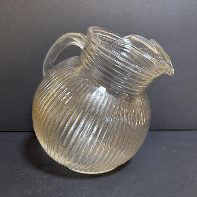 LOT 195: Vintage Orange Juice Serving Pitcher, Tomato Juice Serving Pitched, MCM Tilted Clear Pitcher, Anchor Hocking Tulip Jar w/Lid,...