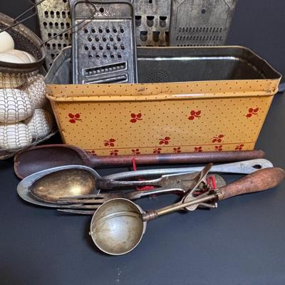 LOT 203: Antique Cast Iron Dover Egg Beater, Vintage Bread Tin, Graters, Utensils, Blown-out Eggs in Wire Basket