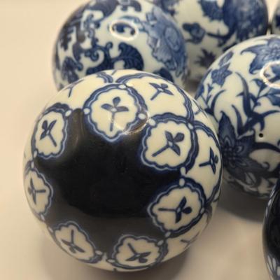 LOT 10L: Wicker Basket with Seven Blue and White Ceramic Decor Balls