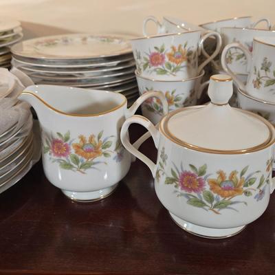 LOT 79: Set of Diplomat by Sango Cortina China Service for 12 Including Cream and Sugar, Gravy Boat, & Serving Platter and Bowl