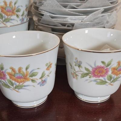 LOT 79: Set of Diplomat by Sango Cortina China Service for 12 Including Cream and Sugar, Gravy Boat, & Serving Platter and Bowl