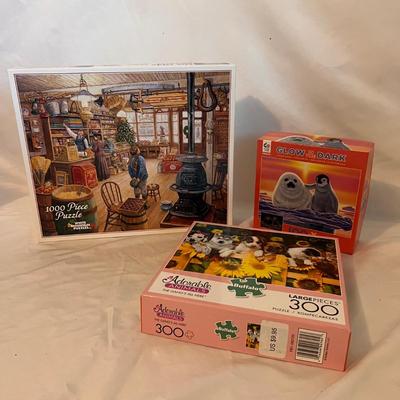 Assortment of Puzzles Including New In Box (B1-RG)