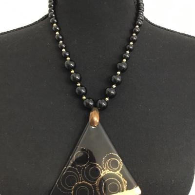 Vintage black beaded necklace with triangle, ceramic gold gilding pendant