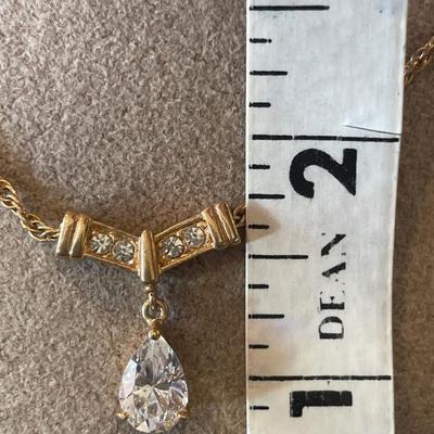 Gold tone bracelet and necklace