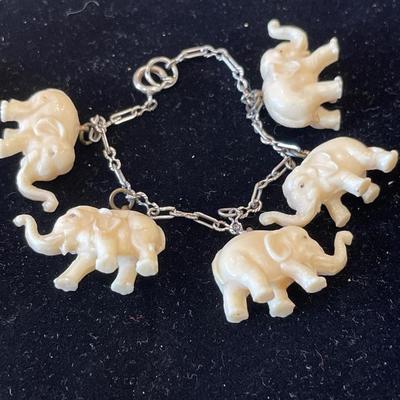 2 cream elephant charm bracelets