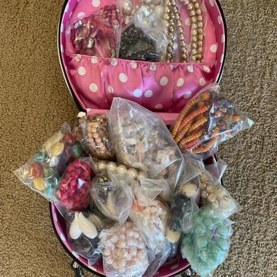 Cute case with beaded necklaces
