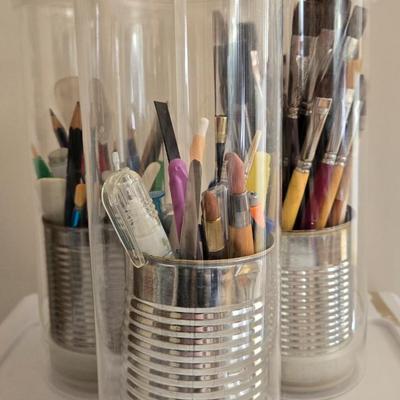 Paint Brush Caddies with Paint Brushes and a New Container of Paint Brushes