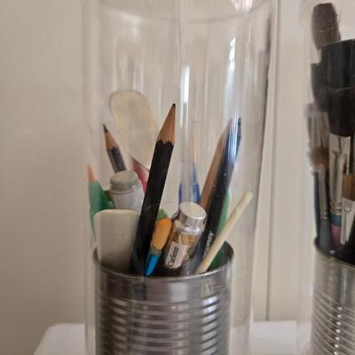 Paint Brush Caddies with Paint Brushes and a New Container of Paint Brushes