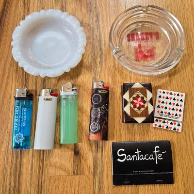 (2) Ashtrays, Lighters, and Matches