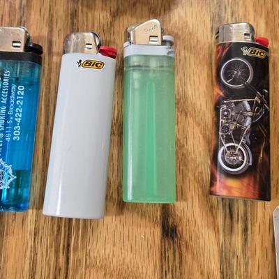 (2) Ashtrays, Lighters, and Matches