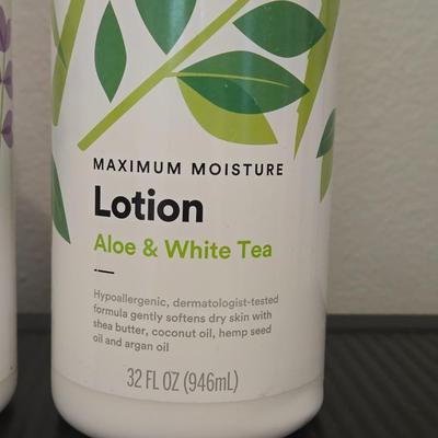(2) Large Bottles of World Market Lotions