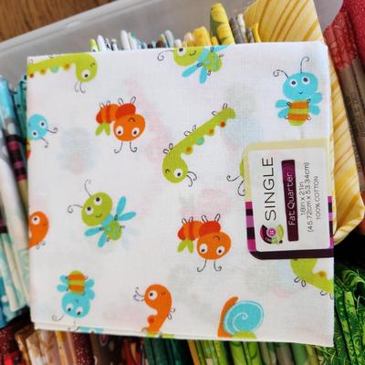 2 containers filled w Quilting Quaters Flats