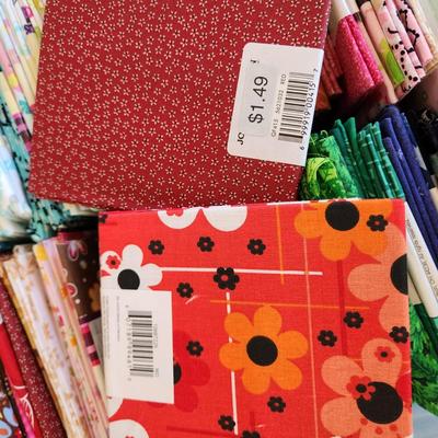 2 containers filled w Quilting Quaters Flats