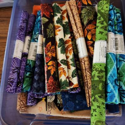 2 containers filled w Quilting Quaters Flats
