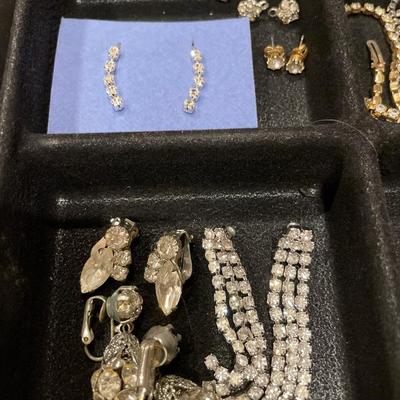 Rhinestone jewelry in a plastic storage