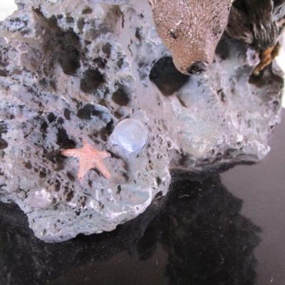 Precious Cargo statuette of otters