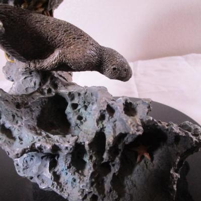 Precious Cargo statuette of otters