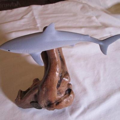 Vintage John Perry signed blue shark figurine on a beryl wood stand