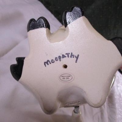 Ceramic cow figurine - head, ears, & tail are on springs