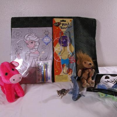 Sale Photo Thumbnail #254: Rail twirler, Frozen coloring glitter page, stuffed lion, shark, dog, Luca toy