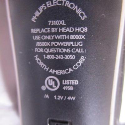 Phillips/Norelco electric razor with case