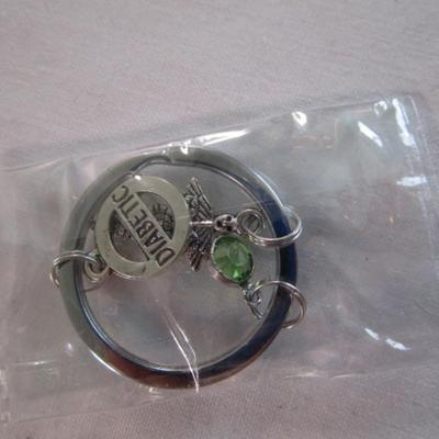 St. Michael's medallion, dragon pendant, diabetic keychain(new in pkg)