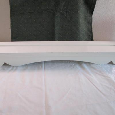 White wood floating shelf