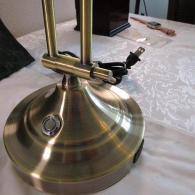 Polished gold-tone desk lamp with touch on/off