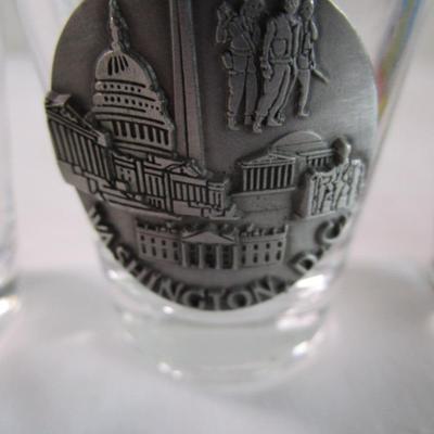 7 shot glasses, various sizes